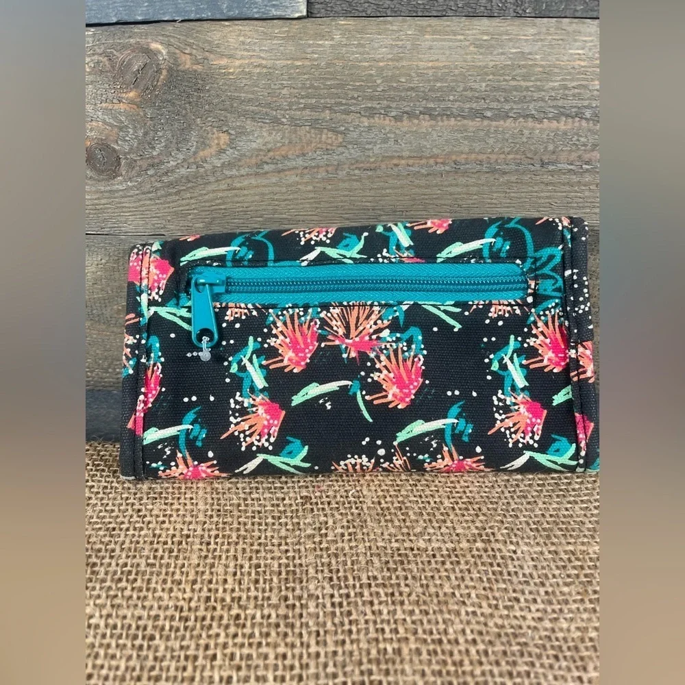 KAVU Big Spender tri-fold wallet in a black‎ canvas with a Floral Print